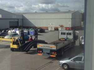 Forklift loading aquaseal products onto a truck